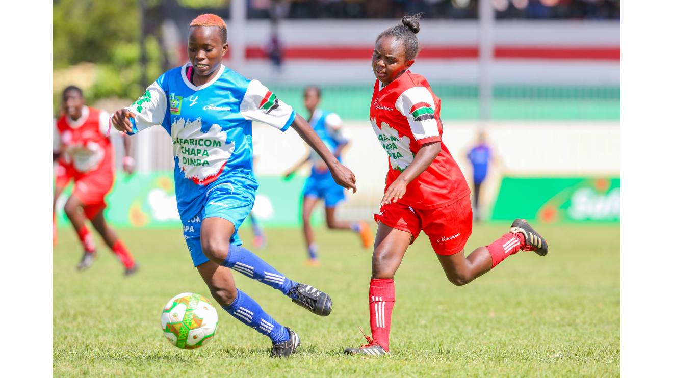Safaricom Chapa Dimba teams battling out on the football pitch. PHOTO/COURTESY